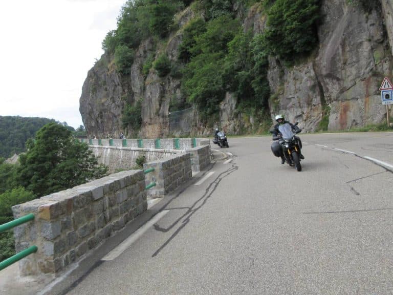 As we depart from our hotel, we'll take a ride over the Schlucht pass, the last mountain road on our guided motorcycle tour to France. The Vosges Mountains are often overlooked because they are close to the Black Forest. But it is a great biking area. The mountains provide one last "hurrah" ride before descending to the flatter landscapes. There are several cafés and restaurants, and they all offer fantastic views as far as you can see. On most of our guided tours, we usually stop at the beautiful lakeside town of Gérardmer. It has several cafés and boulangeries for a quick drink and a bite to eat. For most of the day, we'll travel through rolling hills, green pastures, thick woodlands and sleepy villages without setting a wheel on a motorway (unless we choose to). It almost sounds like reading a travel magazine, but it's true. Your comfortable hotel in the heart of the Champagne Region will welcome us with a comfortable room and a gourmet evening meal.