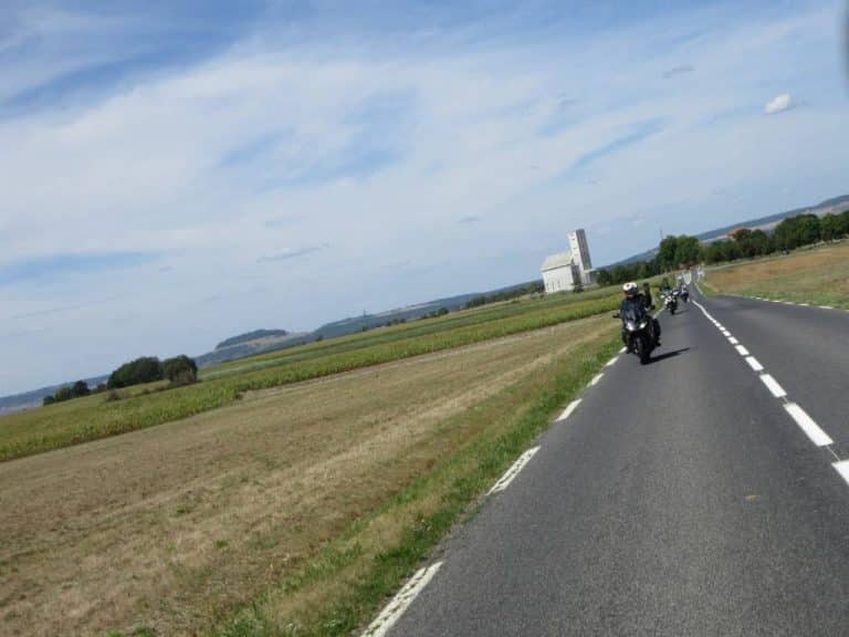 As we depart from our hotel, we'll take a ride over the Schlucht pass, the last mountain road on our guided motorcycle tour to France. The Vosges Mountains are often overlooked because they are close to the Black Forest. But it is a great biking area. The mountains provide one last "hurrah" ride before descending to the flatter landscapes. There are several cafés and restaurants, and they all offer fantastic views as far as you can see. On most of our guided tours, we usually stop at the beautiful lakeside town of Gérardmer. It has several cafés and boulangeries for a quick drink and a bite to eat. For most of the day, we'll travel through rolling hills, green pastures, thick woodlands and sleepy villages without setting a wheel on a motorway (unless we choose to). It almost sounds like reading a travel magazine, but it's true. Your comfortable hotel in the heart of the Champagne Region will welcome us with a comfortable room and a gourmet evening meal.